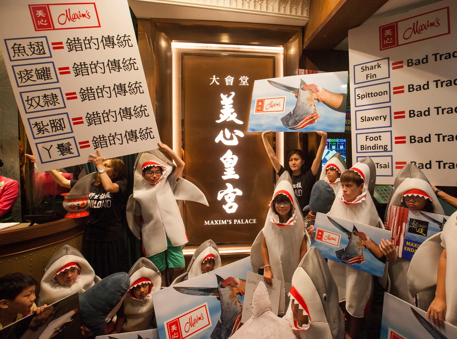WildAid activists demonstrate against the shark fin trade outside a Maxim's restaurant in Central, Hong Kong (Image: Alex Hofford)