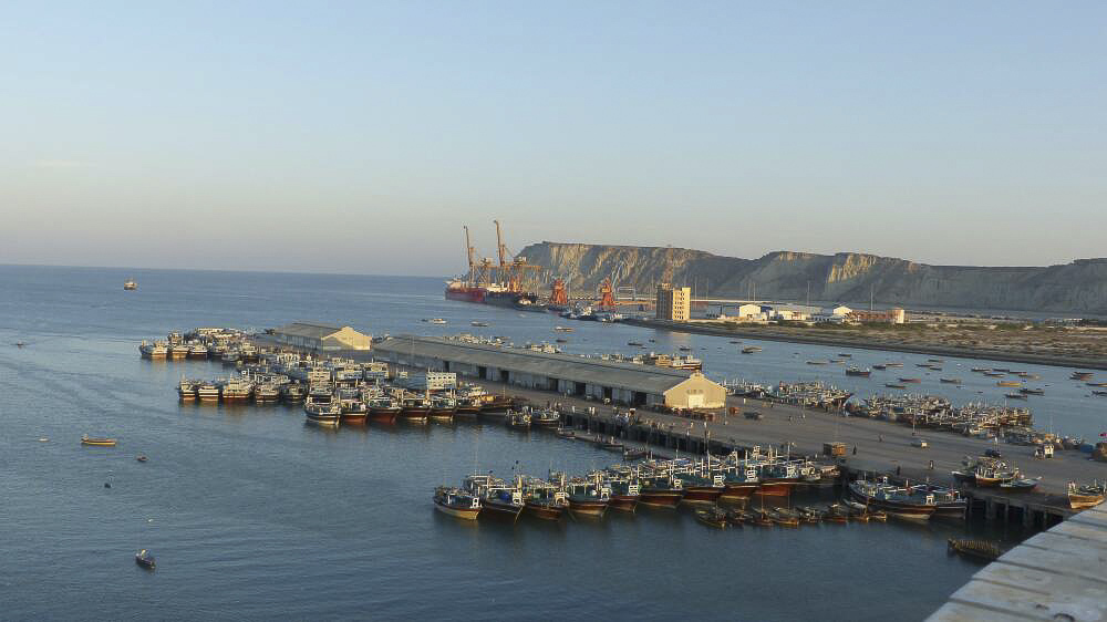 ships in gwadar port with a hazy blue sky