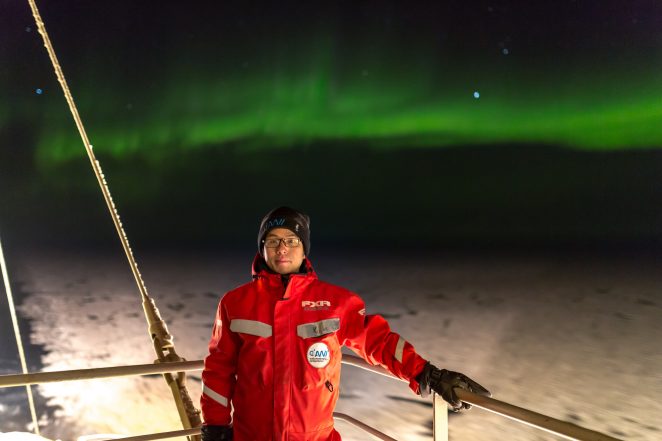 Chinese sea ice physicist Lei Ruibo enjoying the polar sights (Image © Lei Ruibo)