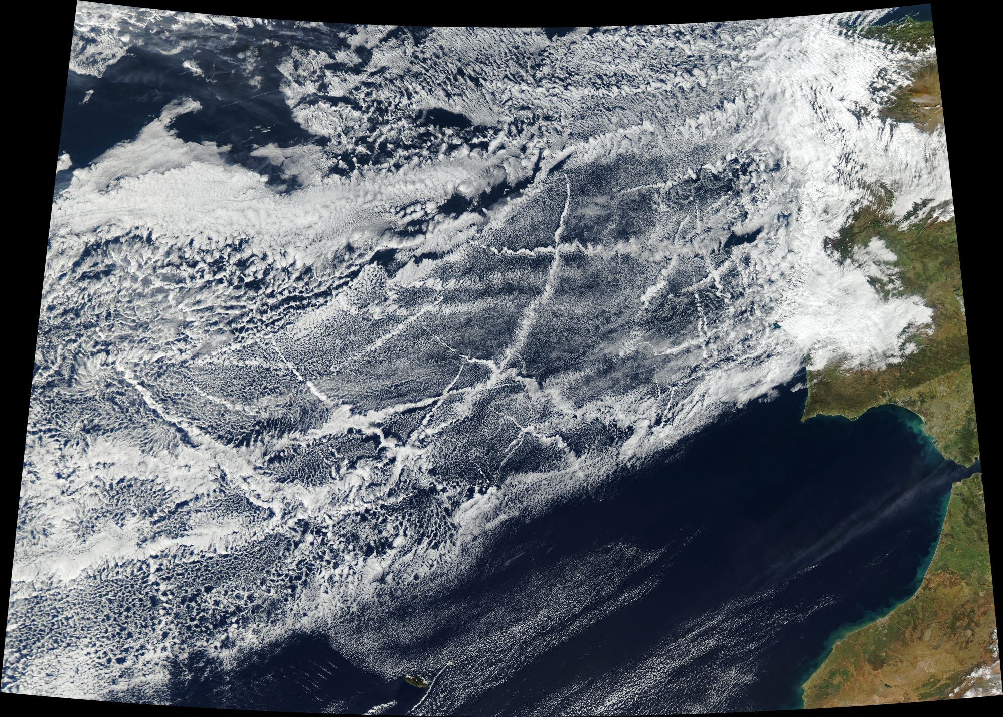 ship pollution satellite image, lines in clouds caused by shipping pollution