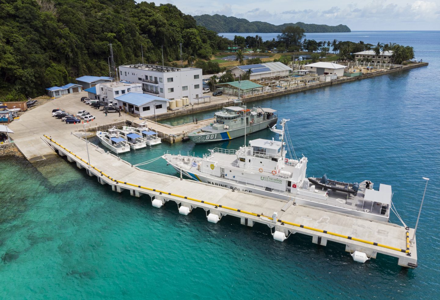 With international support, including a new patrol boat gifted in 2018 by Japan’s Nippon Foundation (white vessel in foreground), Palau’s marine law enforcement capabilities have improved greatly in recent years. 
