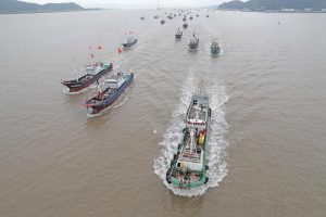 <p>Fishing boats depart a Zhejiang port on the day a four-and-a-half month closed season ended, 16 September 2020 (Image: Alamy)</p>