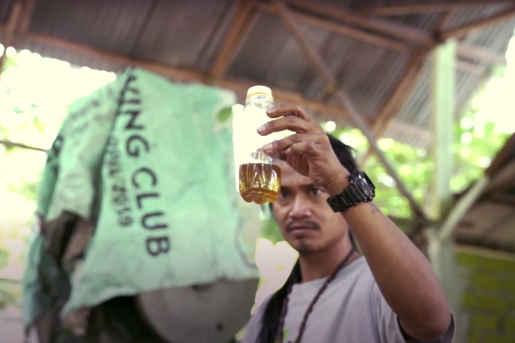 A bottle containing fuel made of plastic waste by Jakarta-based social enterprise Landscape Indonesia