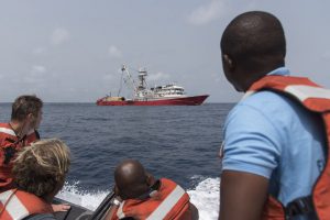 Fishery inspectors approach a Spanish tuna boat in Sierra Leonean waters.