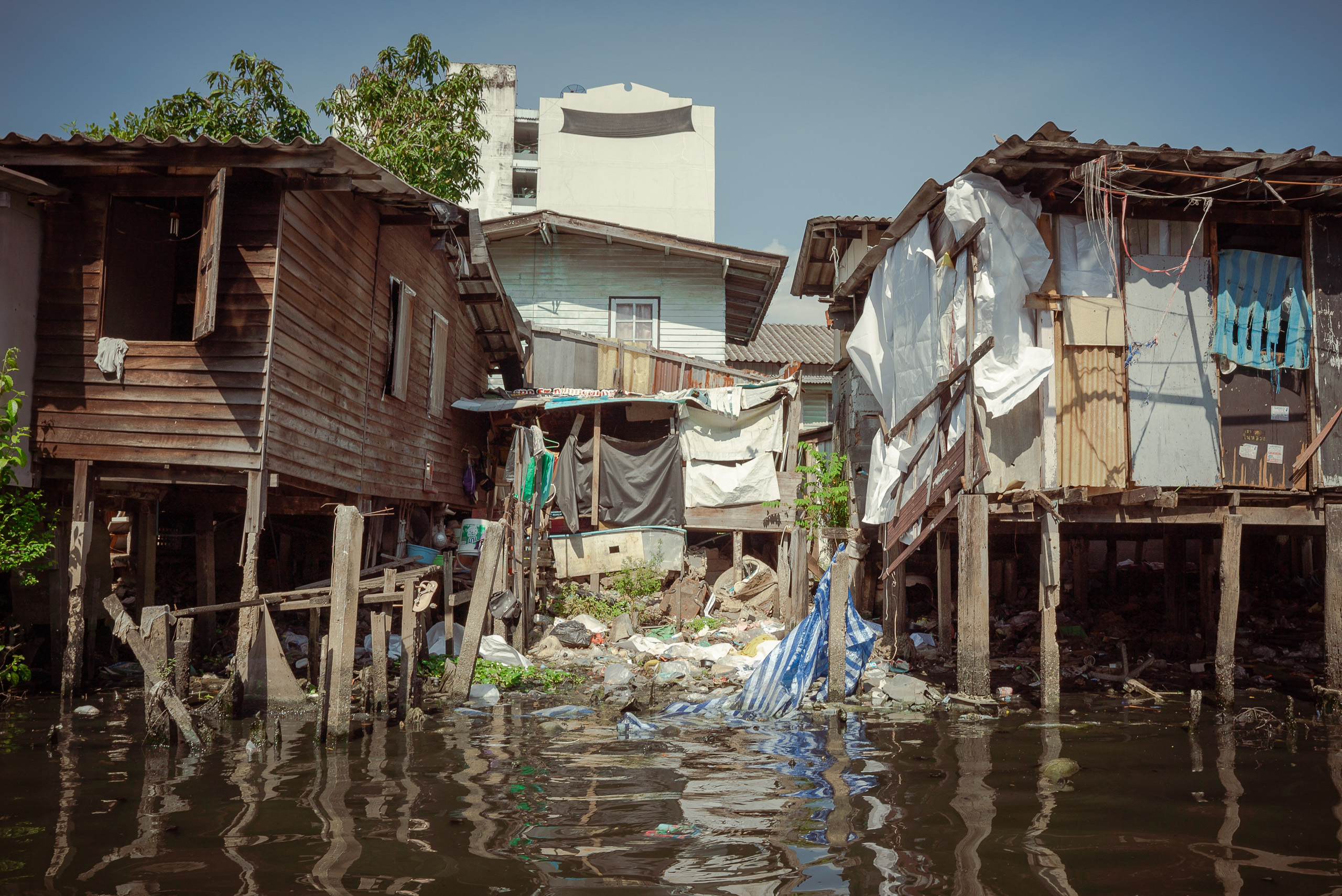 houses on polluted canal