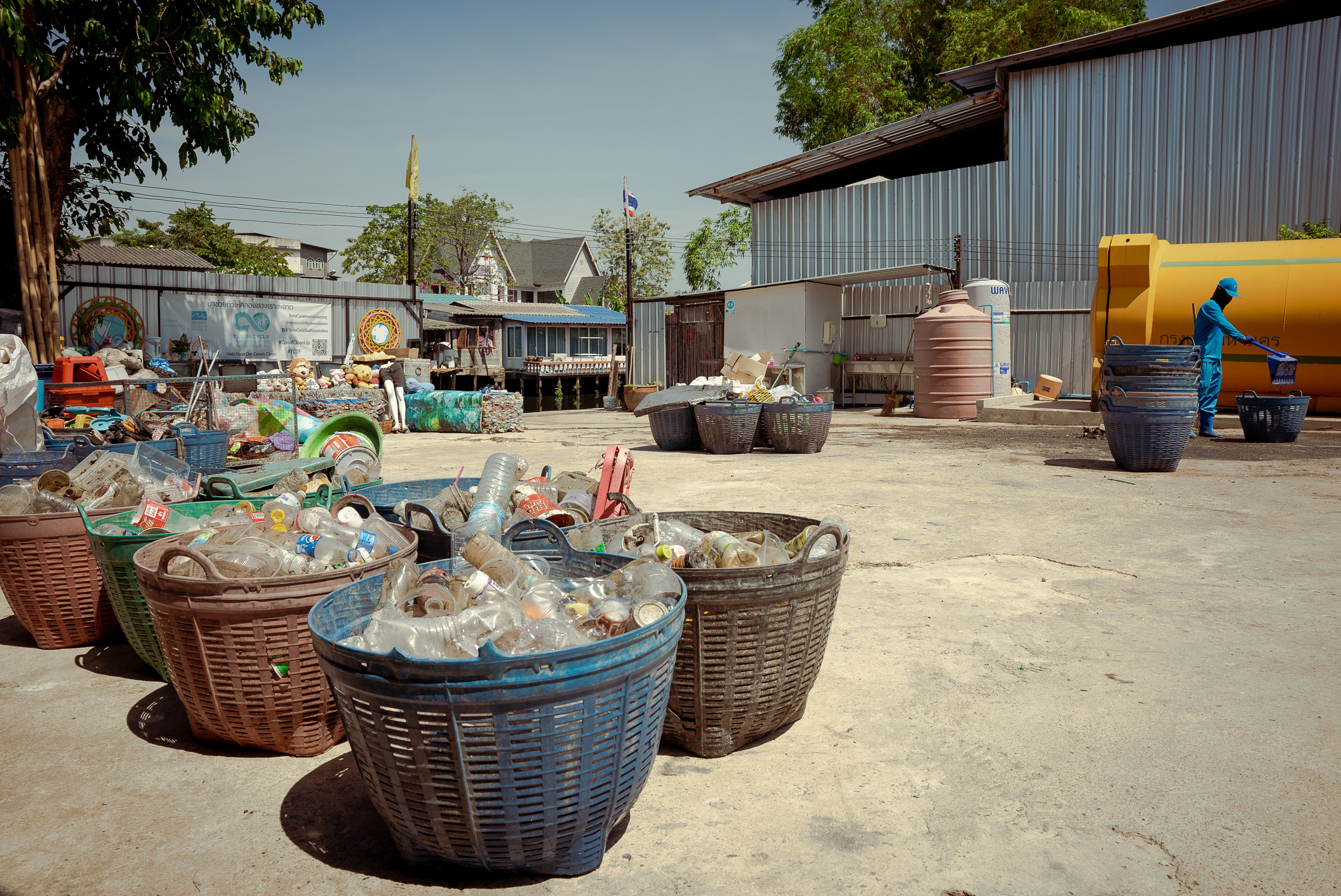 baskets of waste on ground