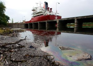 <p>Land-based activities and shipping are the two biggest sources of ocean oil slicks (Image: Christinne Muschi / Alamy)</p>